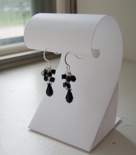 My black cluster earrings on a display I designed and made from card stock.  I love how it looks, and I may put up a tutorial in my blog if it holds up. Jewerly Display, Photographing Jewelry, Jewerly Displays, Diy Display, Diy Jewelry Display, Craft Stalls, Craft Fair Displays, Quilling Tutorial, Jewelry Displays