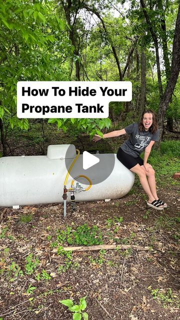 maggie mcgaugh on Instagram: "Propane tank gets camouflaged! 😏  If it weren’t for @ferrellgas , I’d still be stuck on hold trying to reach someone who services my area. 😂  #ad Ferrellgas made my life easier, and with my saved time and a little hard work, I got this beautiful view.   Click the link in my bio to get a propane price quote from Ferrellgas.   #FuelLifeSimply #Ferrellgas #propanetankmakeover #frontyardmakecover #yardmakeover" Covering Propane Tank Ideas, Large Propane Tank Hide Cover Up, Hiding Propane Tank, Propane Tank Art Ideas, How To Hide Propane Tank In Yard, Hide Propane Tank Ideas, Propane Tank Hide, Painted Propane Tanks Ideas, Propane Tank Landscaping Ideas