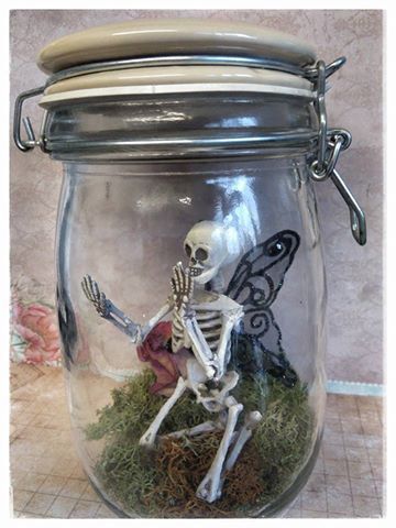 dead fairy in a jar, fairy skeleton Skeleton In A Jar, Goth Fairy Decor, Fairy Skeleton In A Jar Diy, Diy Skeleton Fairies, Dollar Tree Skeleton Fairy, Dead Fairy Costume, Skeleton Fairy Diy, Spooky Crafts Diy, Fairy Skeletons