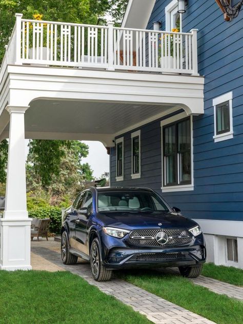 The porte-cochère style carport is the perfect spot to park the new car that the winner of HGTV Urban Oasis 2023 will also bring home. Carport Addition, Southern Nights, Geometric Side Table, Spacious Backyard, Deck Pictures, British Colonial Decor, Garage Addition, Wood Island, Carport Designs