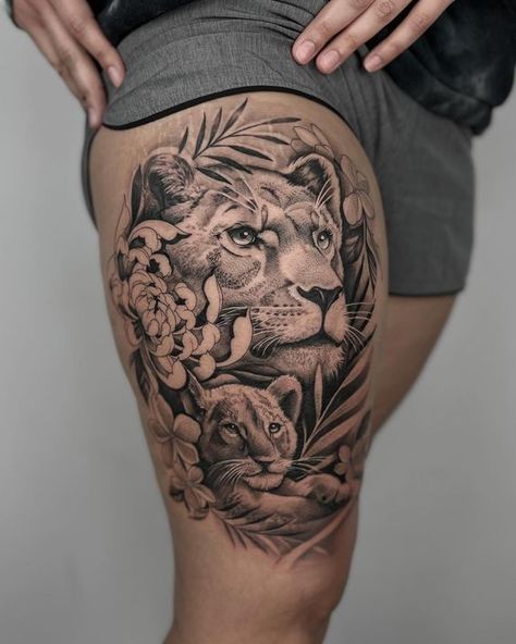 Discover the world of lion tattoos in our article. From deep symbolism and rich history to placement options and best designs. Lioness And Cub Tattoo, Lion Cub Tattoo, Lion Back Tattoo, Lioness Tattoo Design, Thigh Tattoo Men, Arm Tattoos For Guys Forearm, Cubs Tattoo, Lioness Tattoo, Lion Tattoo Sleeves