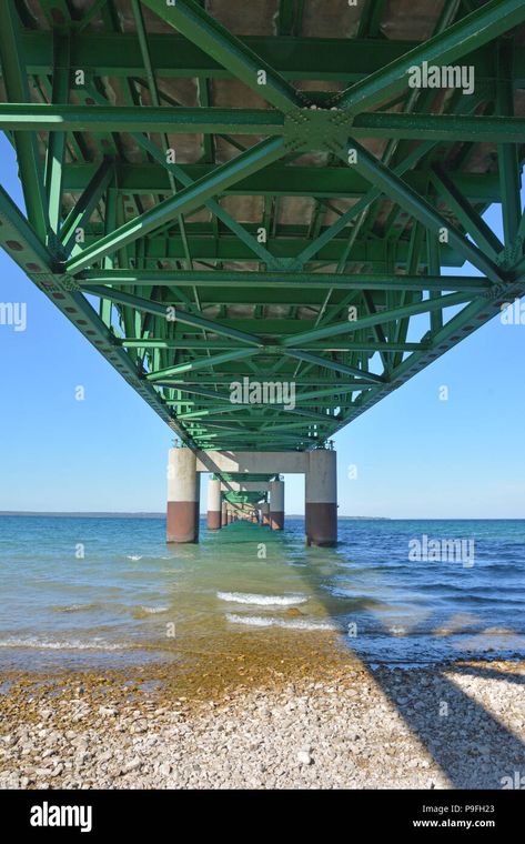 Download this stock image: A view of the underneath of the Mackinac Bridge in Mackinaw City, Michigan looking north from the lower peninsula to the upper peninsula. - P9FH23 from Alamy's library of millions of high resolution stock photos, illustrations and vectors. Mackinaw Bridge, Mackinaw City, Mackinac Bridge, Upper Peninsula, Detroit Michigan, Amazing Architecture, Michigan, Photo Image, Bridge