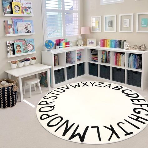 PRICES MAY VARY. Lovely Alphabet Design: Classic Alphabets circular round mat helps boys and girls learn 26 letters, spell names, simple words or sing the ABC or as a cute decoration for kids' bedroom Soft and Comfortable: Faux wool material makes a good balance between comfort and durability, 0.25'' thickness provides some cushioning, perfect for babies just learning to sit or crawl, and for teens' reading nooks Easy to Clean: Most of the time you just need to vacuum it regularly. For extra cle Nursery Area Rug, Alphabet Learning, Rug Circle, Toddler Playroom, Kids Rug, Home Daycare, Centre Commercial, Nursery Rug, W Hotel