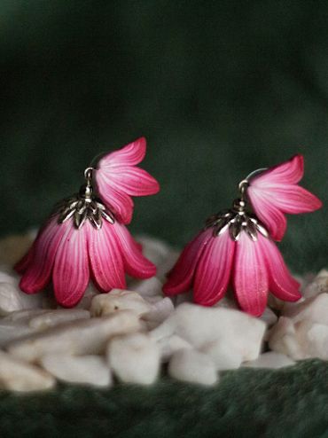 An ode to spring, this #jhumka has finely crafted petals blooming out in the shape of a lotus. In natural shades of pink they look ethreal - See more at: http://www.koraltree.com/Floral/Lotus-Trance-jhumka-id-1853791.html Clay Jhumka Earrings, Clay Jhumka, Terracotta Jewellery Designs, Diy Necklace Making, Clay Accessories, Earrings Diy Handmade, Terracotta Earrings, Jewellery Diy, Clay Works