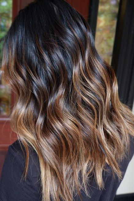 15 Stunning Examples of Melted Caramel Hair To Bring to Your Colorist This Fall | Like a dollop of cream into a dark roast espresso, this color is what every mocha-hued brunette needs to have her mane warmed-up and fall-ready. #southernliving #haircolor #hairstyle Brown Hair With Toffee Balayage, Root Melt Brunette To Copper, Dark Roots Caramel Ends, Root Melt Caramel Balayage, Caramel Balayage By Hair Pattern, Caramel Machiatto Hair, Color Melt Dark Hair, Dark Hair Melt, Fall Hair Color For Brunettes Ombre