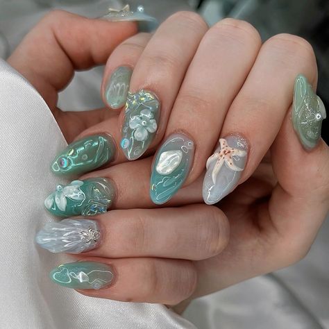 🌬️⋆ aquamarine ˚｡🫧 Don’t want to wake up from this dreamy set 🫠🩵 client requested my press ons design on Short Almond Gelx 🦋 DM my insta to book for appts or 1:1 nail training 🧚🏻 new clients welcome, August spots on my highlight 🩵 #nailinspo #naildesign #fairycorenails #shellnails #beachnails #summernails #naturenails #3dflowernails #3dnailart #mermaidnails #chromenails #gelxnails #nails2inspire #trendynails Aquamarine Nails, New Clients Welcome, Nail Training, Welcome August, 3d Flower Nails, Short Almond, Mermaid Nails, Hand Reference, Press Ons