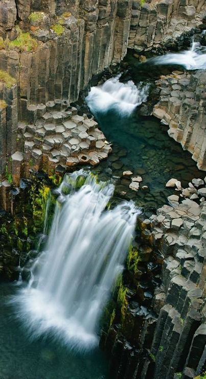 At Litlanesfoss, the waterfall cross-sections an ancient lava flow, which formed columns as it cooled. http://photography.nationalgeographic.com/photography/photo-of-the-day/litlanesfoss-waterfall-iceland/ Iceland Pictures, Travel Iceland, Phrasal Verbs, Water Falls, Iceland Travel, Beautiful Waterfalls, Pretty Places, Places Around The World, Places I Want To Go