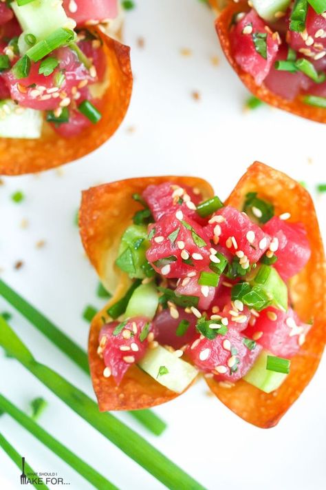 Freshly prepared tuna tartare in crispy wonton cups is a bright and elegant appetizer. Great for summer parties or entertaining. It's a simple finger food recipe with an Asian flair. #tunatartare #appetizer #easyrecipes #wontons Tuna Tartare With Wonton Chips, Tuna Wonton Appetizer, Tartare Recipe, Tuna Tartar, Tuna Tartare, Crispy Wonton, Wonton Cups, Won Ton, Elegant Appetizers