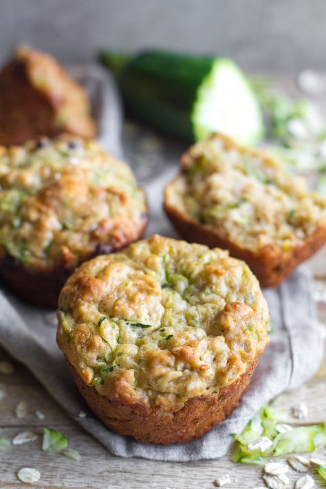 You won't find any butter or oil in these ridiculously soft and tender Zucchini Oat Greek Yogurt Muffins! They're naturally sweetened and perfect for breakfast or healthy snacking. | runningwithspoons.com #recipe #snack #summer Zucchini Parmesan Muffins, Oat Greek Yogurt Muffins, August Food, Greek Yogurt Muffins, Clean Sweets, Toddler Foods, Yogurt Muffins, Healthier Desserts, Savory Muffins