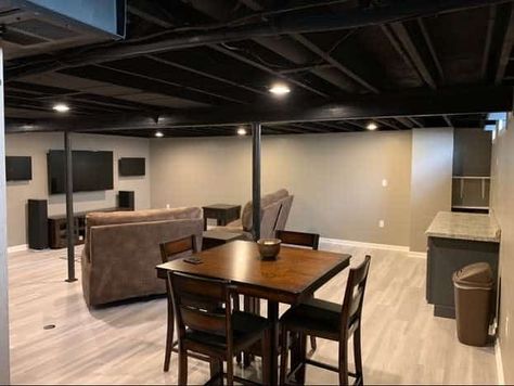 The Top 30+ Unfinished Basement Ideas - Interior Home and Design - Next Luxury Table And Chairs Basement, Black Basement Ceiling, Unfinished Basement Walls, Basement Wall Colors, Unfinished Basement Ceiling, Exposed Basement Ceiling, Basement Ceiling Painted, Low Ceiling Basement, Basement Painting