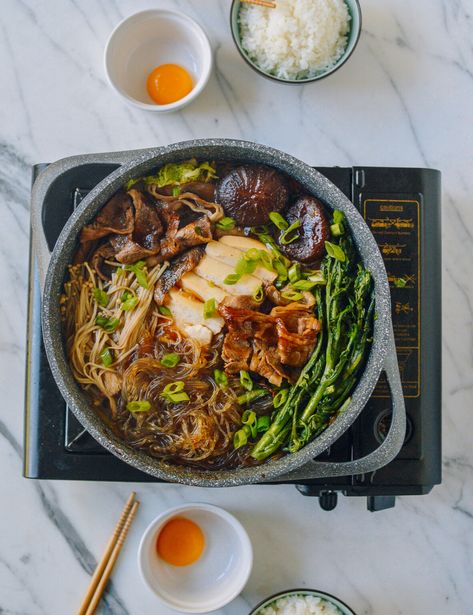 Sukiyaki is a Japanese hot pot dish of beef, vegetables, tofu, and noodles simmered in a sweet sauce. It's easy, interactive and fun to make! Source: thewoksoflife.com Sukiyaki Recipe, Wok Of Life, Woks Of Life, The Woks Of Life, One Pot Meal, Pak Choi, Japanese Cooking, Woks, Japanese Dishes