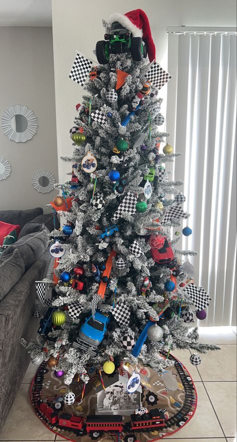 Construction Theme Christmas Tree Ideas, Boys Christmas Trees, Cars Theme Christmas Tree, Monster Truck Christmas Tree Ideas, Nascar Christmas Tree, Kids Themed Christmas Tree Ideas, Little Boys Christmas Tree, Hot Wheel Christmas Tree, Monster Jam Christmas Tree