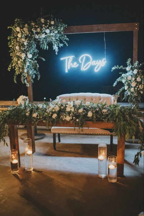 Neon Wedding Sign Behind Head Table, Led Wedding Sign Sweetheart Table, Neon Sign Ideas For Wedding, Sweetheart Table Arch Backdrop, Wedding Arch With Led Sign, Bride And Groom Table Neon Sign, Neon Sign Wedding Head Table, Neon Sign Behind Sweetheart Table, Sweetheart Table Wedding With Neon Sign