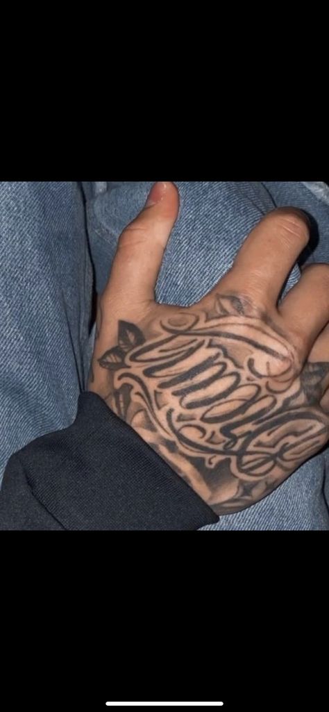 Men With Hand Tattoos, Hand Name Tattoos Men, Black Man Hand Tattoo, Black Male Hand Tattoos, Hand Tat Ideas, Hand Tattoo For Guys, Hood Hand Tattoos, Hand Tats For Guys, Black Men Hand Tattoos