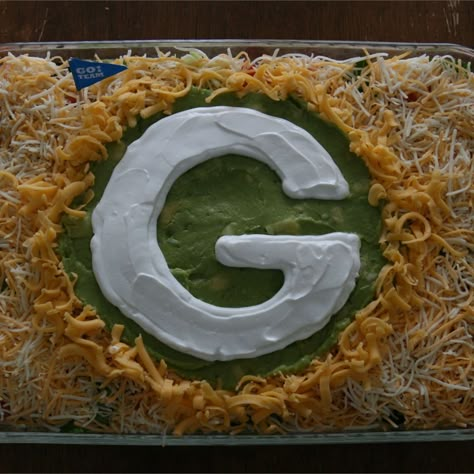 Green Bay Packers Food, Football Themed Snacks, Seven Layer Taco Dip, Packer Party, Packers Party, Football Foods, Layered Taco Dip, Layered Dip Recipes, Football Party Foods