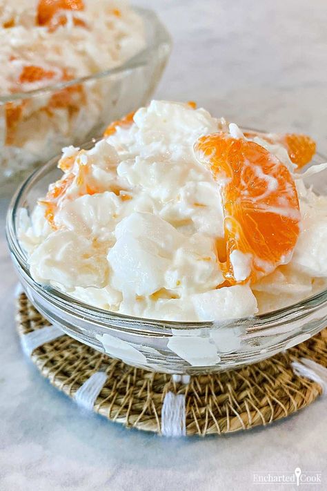 Not too sweet and easy to make recipe for fruit salad containing Mandarin oranges, pineapple, mini-marshmallows, shredded coconut, and sour cream. 5 Cup Fruit Salad, Orange Fluff Salad, Pineapple Fluff, Fluff Salad Recipes, Orange Fluff, Pretzel Desserts, Pumpkin Cream Cheese Pie, Fluff Salad, Cranberry Cheesecake