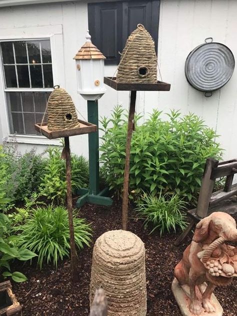 Beehive Shelter, Bee Skeps In The Garden, Wild Bee House, Bee Skep House, Rooftop Beehive, Native Bee House, Primitive Garden Ideas, Barnyard Decor, Primitive Gardens