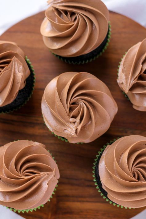 Have you ever tried Italian meringue buttercream? You're going to love this recipe for chocolate Italian meringue buttercream frosting because it is silky smooth and much less sweet than traditional frosting. This could be your new favorite way to top cakes and cupcakes! #bakesandblunders #recipe #dessert #imbc Chocolate Meringue Frosting, Extreme Cupcakes, Chocolate Italian Buttercream, Chocolate Italian Meringue Buttercream, Italian Buttercream Frosting, Meringue Buttercream Frosting, Meringue Icing, Chocolate Swiss Meringue Buttercream, Cake Flavours