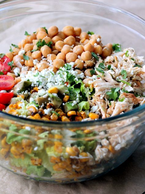 Easy healthy chicken chickpea chopped salad loaded with protein and fresh ingredients like grilled corn, grape tomatoes, crunchy romaine, creamy avocado, and your favorite dressing. Chickpea Chopped Salad, Chickpea Chicken Salad, Chickpea Chicken, Chickpea Avocado, Chicken Chickpea, Salad Chicken, Think Food, Chickpea Salad, Chopped Salad