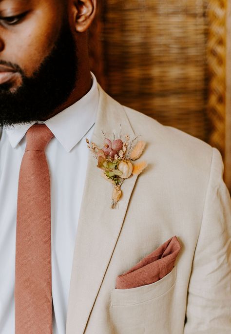 Colorful Dahlia-Inspired Mod Boho Inspiration at The Eloise | Mt. Horeb, WI - Olive Branch Events Co. Blog Coral Mens Wedding Attire, Peach Suit Men Wedding Ideas, Men’s Wedding Suit For Fall, Tan Suit Orange Tie, Sunset Color Palette Wedding Groomsmen, Spring Suits For Men Wedding, Peach Wedding Groomsmen, Peach Groomsmen Attire, Groom Colored Suit