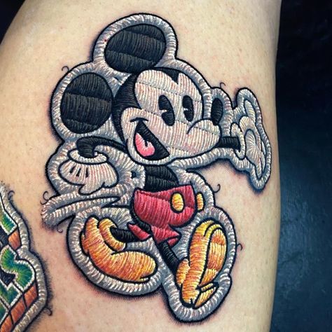 Patch Tattoos, Mickey Tattoo, Mickey Mouse Tattoo, Stitch Tattoo, Embroidery Tattoo, Mouse Tattoos, Geniale Tattoos, Tattoo Design Book, Cartoon Tattoos