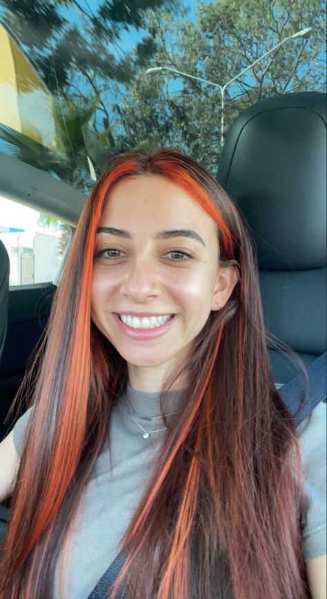 Orange Hair With Colored Streaks, Honey Coloured Highlights, Brunette Orange Highlights, Bright Orange Highlights In Brown Hair, Dark Brown Hair With Orange Highlights, Brown Hair Orange Highlights, Orange Money Piece Hair, Brown Hair With Orange Highlights, Orange Peekaboo Hair