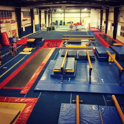 Gymnastics Center, Gymnastics Floor, Gymnastics Room, Elite Gymnastics, School Building Design, Usa House, Kids Gymnastics, Gymnastics Gym, Gymnastics Training