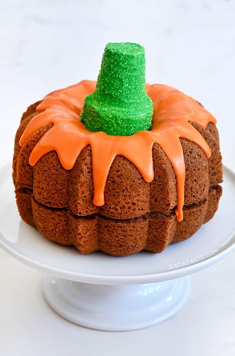 Celebrate the season with a shortcut recipe for Easy Pumpkin Bundt Cake that transforms store-bought cake mix into the ultimate fall dessert. #justatasterecipes Pumpkin Bundt Cake With Box Cake, Halloween Bundt Cake, Pumpkin Bundt Cakes, Gooey Desserts, Pumpkin Bundt Cake Recipes, Mini Bundt Cakes Recipes, Pasteles Halloween, Pumpkin Bundt, Pumpkin Bundt Cake