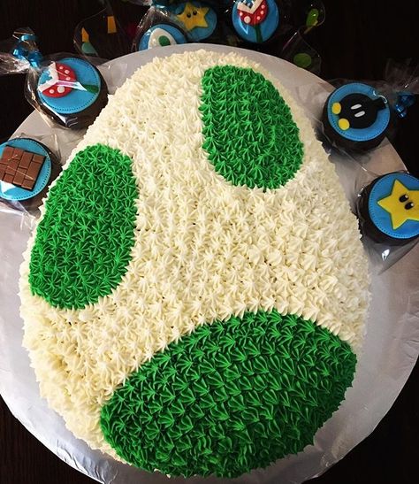 Yoshi egg cake... Chocolate cake filling with @nutella and decorated with vanilla buttercream #mariobrosparty #birhdayboy #chambersburg… Yoshi Egg Cake, Yoshi Cupcakes, Super Mario 5th Birthday, Yoshi Birthday Party, Chocolate Cake Filling, Yoshi Cake, Yoshi Party, Luigi Party, Nintendo Cake