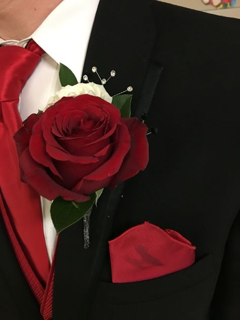 Red roses white tea roses Crystal embellishment boutineer Groom Black Suit Red Tie, Boutineer Ideas Prom, Black Tie Wedding Red Roses, Red And White Boutonniere, Black Suit Red Boutonniere, Red Rose Boutonniere Prom, Red Wedding Pocket Square, Black Suit Red Tie, Black Suit White Shirt