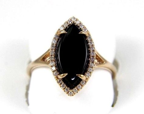 ITEM SPECIFICS This a Fancy Fine Marquise Cut Natural Onyx Ladys Ring w/Diamond Halo. It is made of 100% natural 14kt rose gold and is in Brand New Condition. It has a CTW of 2.05Ct (0.15 Diamond/1.90 Onyx) and weighs 2.9 grams. The fancy diamonds have a clarity of SI1 and G color. Onyx Engagement Ring, Cheap Rings, Black Diamond Ring, Fancy Diamonds, Dream Ring, Sea Glass Jewelry, Marquise Cut, Diamond Halo, Unique Engagement Rings