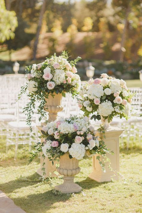 Floral pedestal decor for wedding ceremony. Romantic wedding ideas.   #weddingceremony #weddingflorals #temeculawedding #floralinspiration Chandelier Arbor Wedding, Timeless Wedding Cake, Annapolis Wedding, Wedding Alters, Temecula California, White Roses Wedding, Aisle Flowers, Rock Wedding, Wedding Altars