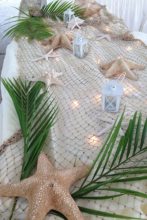 Cheap Wedding Decorations Which Look Chic ❤ See more: http://www.weddingforward.com/cheap-wedding-decorations/ #weddings Fishing Net Table Decor, Cancun Party Theme, Bora Bora Themed Party, Beach Theme Party Aesthetic, Island Birthday Theme, Tropical Buffet, Buffett Table, Tropisk Fest, Luau Decor