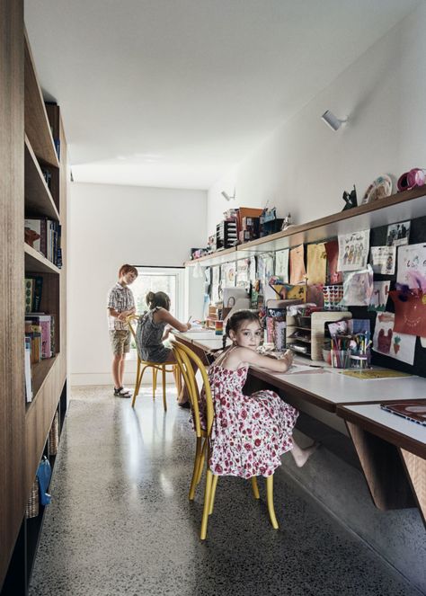 The kids' study has an abundance of toy storage Melbourne Architecture, Melbourne House, Kids Study, Terrazzo Flooring, Study Areas, House Elevation, Home Sport, Modern Kids, House Extensions