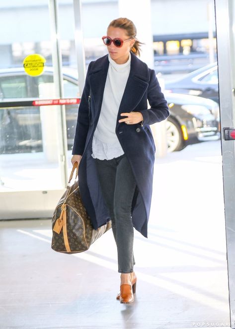 Alicia Vikander Airport Style | POPSUGAR Fashion Alicia Vikander Michael Fassbender, Black Pants Outfits, Acting Life, Alicia Vikander Style, Airport Outfit Summer, 20 Outfits, White Turtleneck Sweater, Louis Vuitton Style, Alicia Vikander