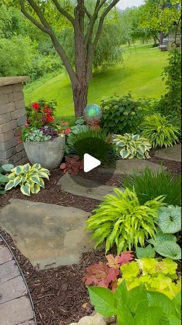 Joy in the Garden 🌸Joyce Merschman Ludlow on Instagram: "Early summer in this part shade zone 5b Iowa garden brings different hues, shape, and textures. This garden has evolved quite a bit over just the last two years. My biggest learning… let plants overlap! It creates flow and connectivity in the garden.  People who have primarily shade gardens, often want more sun. People who have primarily sun gardens, often want more shade. I was a sun gardener that loved it until more shade was created as my tree matured. And now I’ve discovered so many beautiful shade-loving plants and I long for more shade.  Although the container in this reel is in part shade, there’s a matching container with the same plants in full sun. So the plants in this container can take sun and shade. I’ll keep you updat Iowa Garden, Sun People, Landscaping With Large Rocks Natural, Landscaping With Boulders, Garden Flower Beds, Landscaping Inspiration, Shade Flowers, Landscaping With Large Rocks, Rock Garden Landscaping