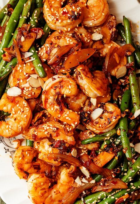 This recipe for chili crisp shrimp and green beans comes together in a flash for a light meal you can make any day of the week. The post Chili Crisp Shrimp and Green Beans appeared first on Tried and True Recipes. Chili Crisp Shrimp Dip, Chili Oil Shrimp, Fly By Jing Sichuan Chili Crisp Recipes, Chili Crisp Shrimp, Green Bean And Shrimp Recipes, Shrimp With Green Beans, Shrimp And Green Beans Recipe, Recipes Using Spicy Chili Crisp, Shrimp Green Beans Recipes