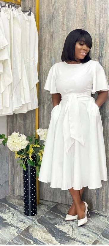 White Dress For Wedding Guest Classy, White Modest Dresses, Flower Materials Styles For Ladies, Christian Dress Outfit, White Dress Styles For Church, White Dresses For Church, Christian Bridesmaid Dresses, Flared Dresses Classy, White Party Dress Classy