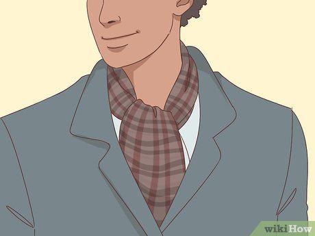 5 Ways to Wear a Scarf for Men - wikiHow How To Tie Mens Scarf, How To Wear A Scarf Men, Way To Wear A Scarf, Scarf Outfit Men, Men Scarves, Mens Scarf Fashion, Soccer Scarf, Wearing A Scarf, Wear A Scarf