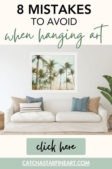 Article 8 Mistakes To Avoid When Hanging art, showing a coastal decor living room with palm tree photo above couch. Wall Decor Size Guide, How To Style Paintings On Wall, Wall Gallery Hanging Options, How To Place Wall Art, Artwork Groupings On Wall, How Big Should Art Be On Wall, Arranging Wall Art, Rules For Hanging Wall Art, Hanging Art Above Couch