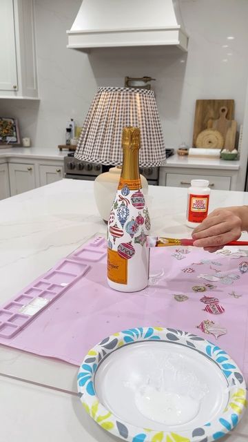 Lauren Holifield on Instagram: "DIY Champagne Bottle Questions! Comment “champagne” for the links ✨" Diy Disco Champagne Bottle, Christmas Painted Wine Bottles, Diy Champagne Bottle, Painting Bottles, Custom Champagne Bottle, Decoupage Bottles, Christmas Champagne, Hand Painted Wine Bottles, Diy Napkins