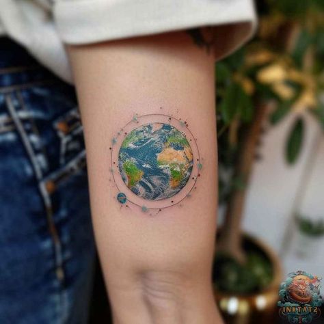 Colorful earth tattoo idea on the arm, bringing the vibrancy and diversity of our planet to life. This mother earth tattoo is perfect for those who love a splash of color. See more at inktat2.com Earth Tattoos, Mother Earth Tattoo, Symbol Of Balance, Science Tattoos, Earth Tattoo, Summer Vision, Planet Tattoos, Tattoo People, Geometric Symbols