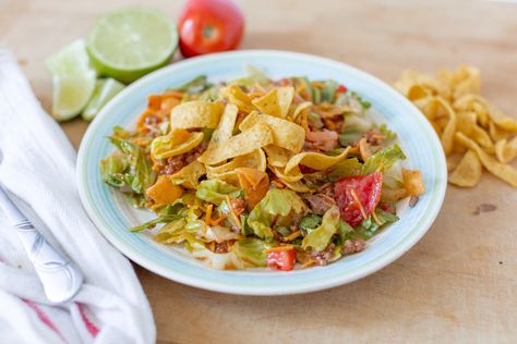 If you've run out of tortillas, but still have all the taco toppings, Corn Chip Salad is here for the rescue! Grab a big bowl, add some fresh lettuce and then pile it up! Throw on the slightly spicy taco meat, the sweet corn, the juicy tomatoes, the salty cheese, and some sweet Catalina dressing and give it a toss. Serve it up with a sprinkle of crunchy corn chips and you've created a meal better than you could have ever imagined. So, don't sweat it! Your tortilla tragedy was reconciled (dare we Corn Chip Salad, Chip Salad, Command Cooking, Lazy Cooking, Catalina Dressing, Corn Chip, Italian Casserole, Crunchy Corn, Asian Noodle Salad