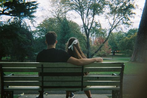 aesthetic cute couple in love on park bench photo taken on a disposable camera Couple On A Bench Aesthetic, Couple At Park Aesthetic, Couple In The Park Photo Ideas, Park Couple Aesthetic, Couple In Park Aesthetics, Bench Couple Poses, Couple Poses In Park, Park Dates Aesthetic, Couple Bench Sitting Aesthetic