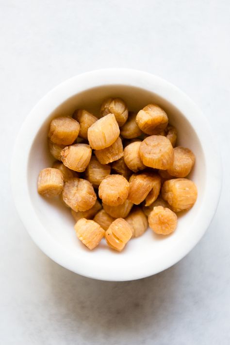 A Quick Guide on Dried Scallops: how to select, store, and use dried scallops #chinesefood #asianpantry Congee Recipe Chinese, Cooking Scallops, Cook Scallops, Congee Recipe, How To Cook Scallops, Scallop Dishes, Dried Scallops, Cantonese Cuisine, Chinese Rice