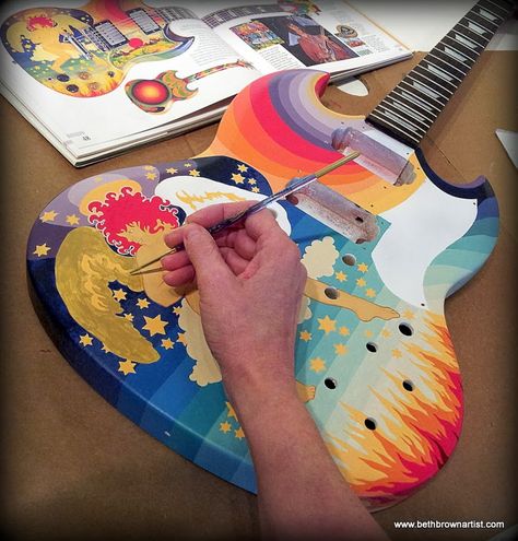 Phase 10 - Recreating Eric Clapton's "Fool" SG Guitar: Painting the angel's wings on the guitar. Todd Rundgren playing the Fool. See more on Phases of the Moonblossom's blog. Painting A Guitar, Painted Electric Guitar, Paint Guitar, Painting Guitar, Painted Guitars, Eric Clapton Guitar, Painted Guitar, Guitar Finishes, Instrument Art