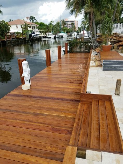 Sealed & stained boat deck & deck on canal Canal Backyard Ideas, Backyard Canal Landscaping, Florida Dock Ideas, Florida Canal Backyard, Boat Deck Ideas, Lakehouse Deck, Mediterranean Beach House, Beach House Backyard, Beach House Pool