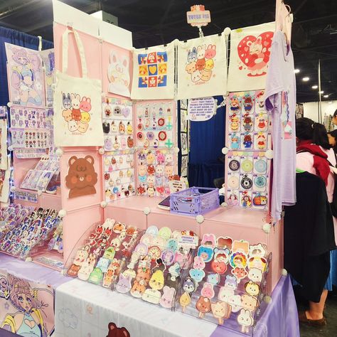 Helloooooo @otakufestfl ✨️✨️ we are here at table 440 ready to see everyone! We have SO much, from apparel to stickers so make sure to swing on by and say hi! #artistalley #otakufest #danmei #kpop Art Market Sticker Display, Artist Alley Sticker Display, Fae Ring, Artist Alley Display Ideas, Artist Alley Display, Selling Aesthetic, Stall Design Ideas, Artist Booth, Art Convention