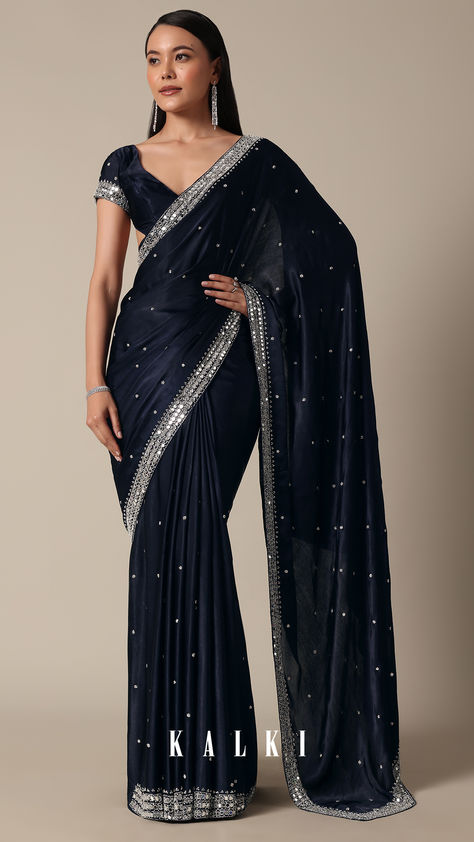 "Indulge in sophistication with this Royal Blue Satin Chinnon Saree. The stones delicately embellish the fabric, creating a luxurious and timeless appeal. The deep blue and navy tones enhance the richness of the saree, making it a perfect choice for party wear. Meticulous detailing and the inclusion of unstitched blouse fabric ensure a personalized fit.
" Blue Velvet Saree, Chinnon Saree, Royal Blue Saree, Velvet Saree, Nykaa Fashion, Yumna Zaidi, Kalki Fashion, Blue Saree, Blue Satin