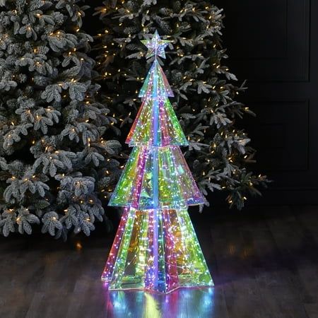 Illuminate your holiday celebrations with our Prismatic Iridescent Christmas Tree crafted by Seasonal LLC. Standing at 45 inches tall and adorned with 320 LED lights, this enchanting tree casts a radiant glow whether displayed indoors or outdoors. Elevate your festive decor with this dazzling centerpiece, designed to enchant and delight throughout the holiday season. Color: Multicolor. Iridescent Christmas Tree, Christmas Led Lights, Iridescent Christmas, White Artificial Christmas Tree, Christmas Tree Clear Lights, Christmas Lighting, Christmas Tree Crafts, Holiday Christmas Tree, Candy Christmas Decorations